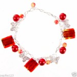 BRACELET VERRE ROUGE PERLE ET PAPILLON