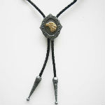 BOLO TIE CRAVATE WESTERN TETE D AIGLE DOREE